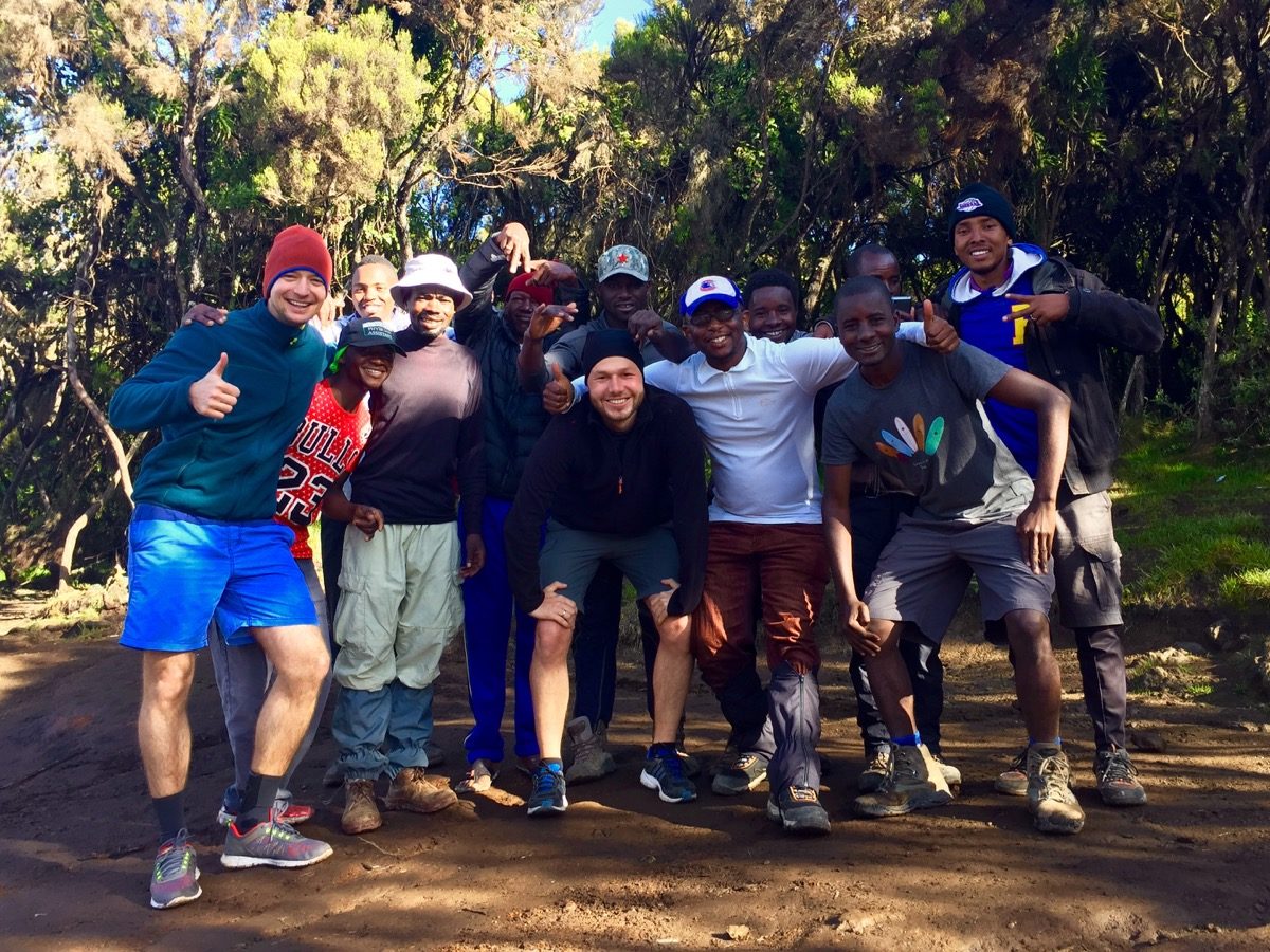 Group photo after a successful ascent of Kilimanjaro